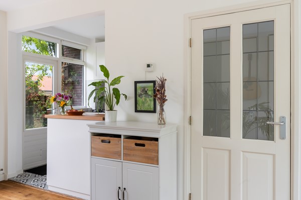Foto - Te koop: Sfeervolle tussenwoning met groene oase!